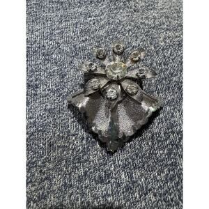 Silver tone and diamond colored vintage broach